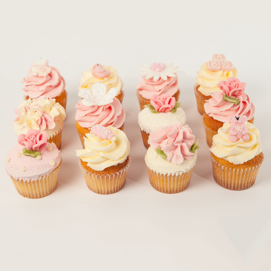 Pink baby hot sale shower cupcakes